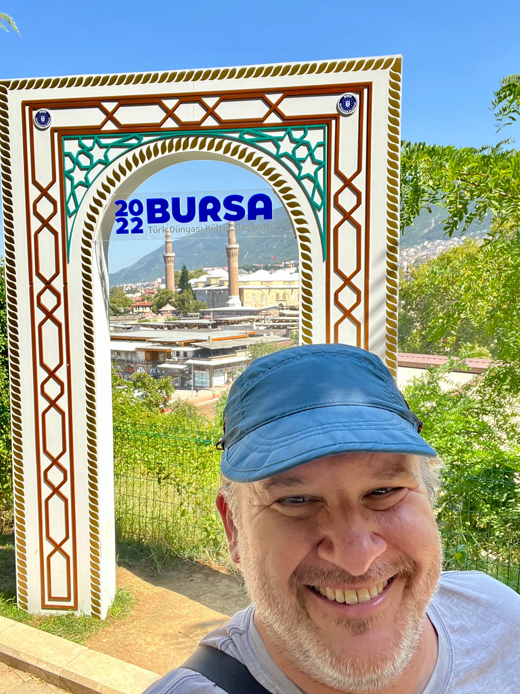 We were in Bursa - the first capital of the Ottoman Empire - in July of this year. I couldn't resist taking a selfie at this photo booth. In the background is the Grand Mosque of Bursa, which was built in 1399. 